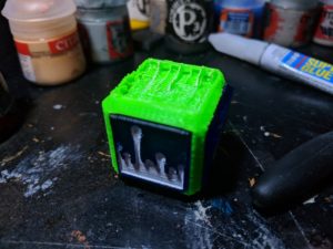 3d printed cube with token insert